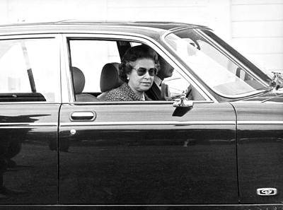 Queen Elizabeth in her Jaguar