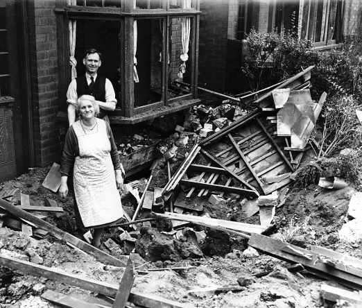 A couple can still smile bravely despite the damage!