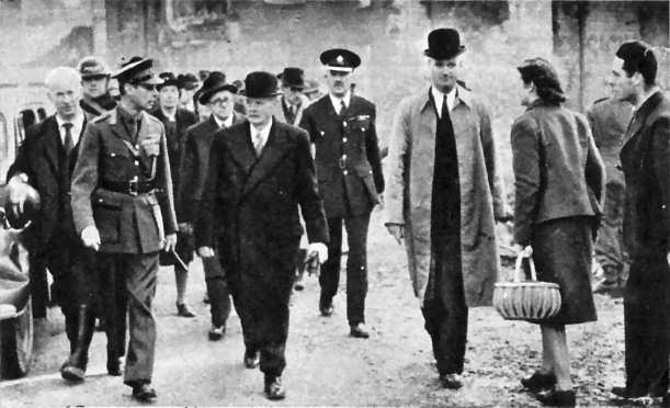 King George VI with the Mayor walking around Coventry on Saturday 16th November 1940.