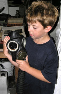 Our Steven with a WWII gas mask, 2005