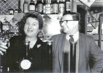 Bill and May always smiling behind the bar at the Broomfield Tavern!