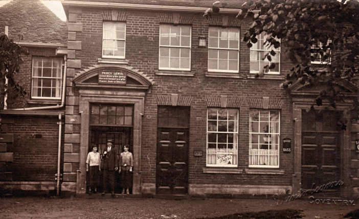 Percy Lewis outside his Pub