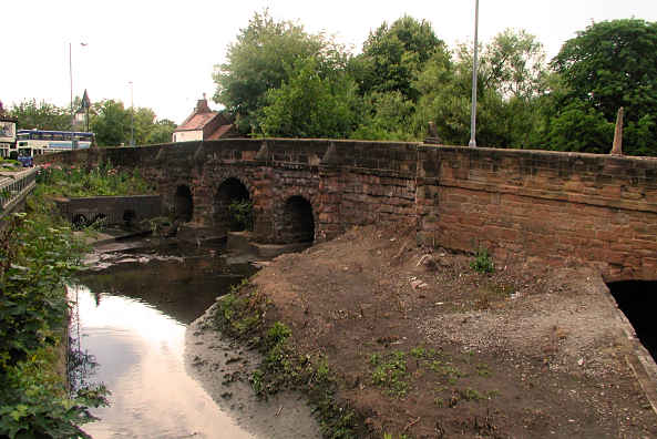 The River Sherbourne and bridge at Spon End